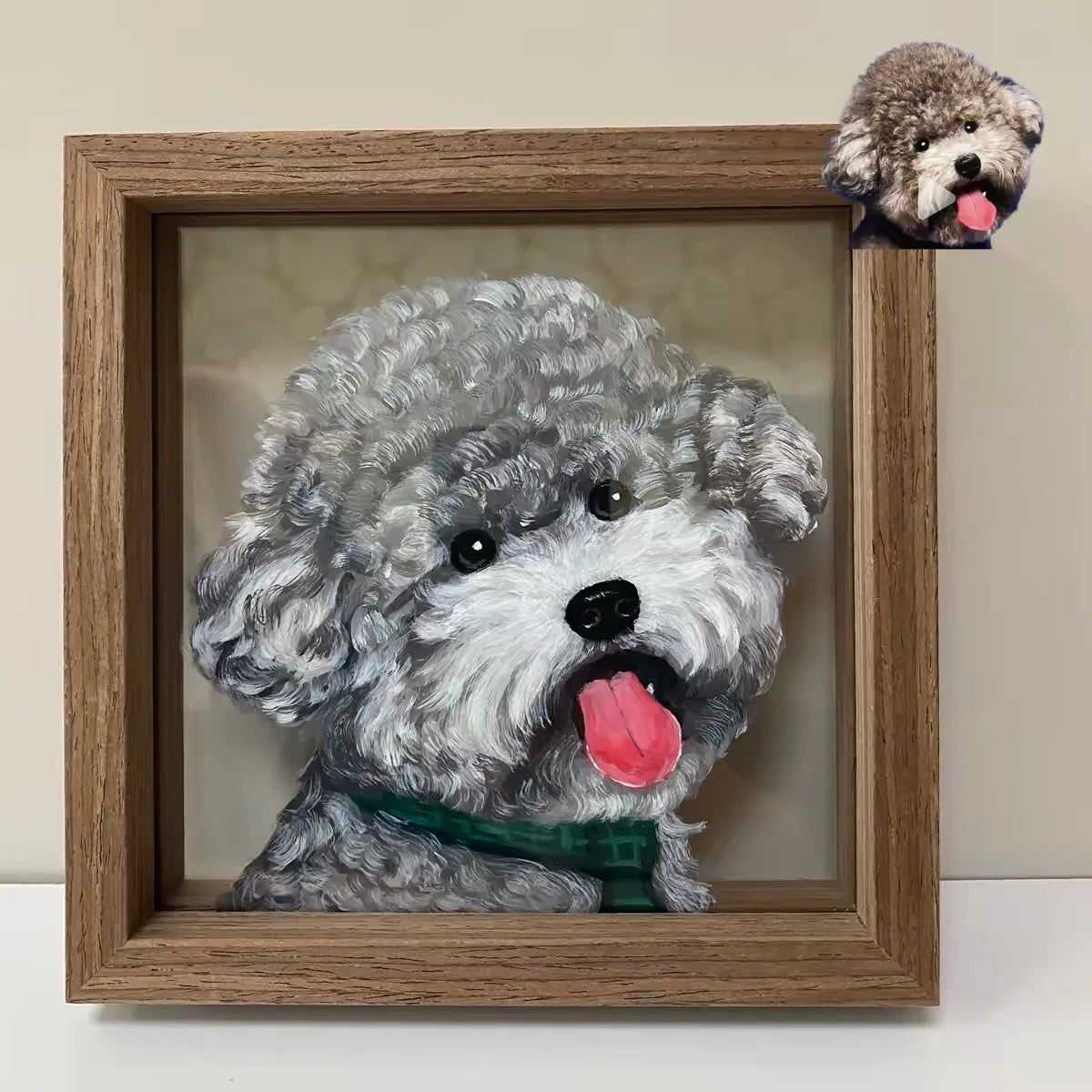 A grey curly-coated dog portrait with a green collar.