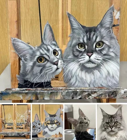 Two long-haired cats painted together, with their reference photographs.