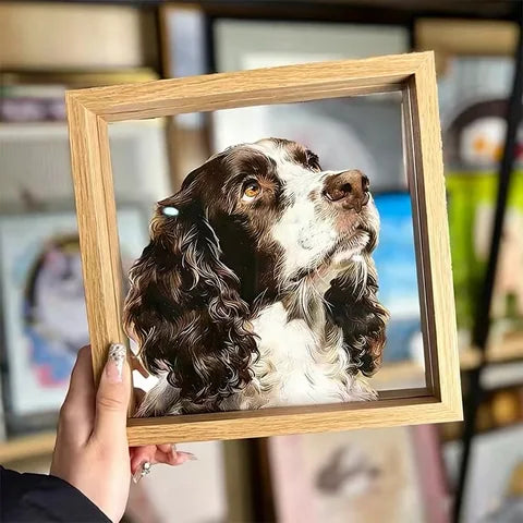 A hand-held spaniel portrait with a brown-and-white coat.