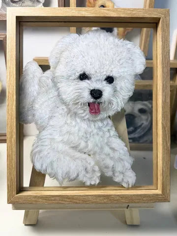 White dog frame on easel, another artwork visible behind.